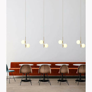 Althar - 3/2 Light White Glass Ball Pendant Light in White Glass and Gold Brass